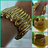 Givenchy Cuff Bracelet Gold Plated Wave-Like Pattern Signed Plaque 72 Grams 1 7/8 Inches Wide 6 3/8 Inches Long