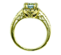 18 Karat Gold Oval Aquamarine Diamond Halo Ring Aquamarine 8 mm X 6 mm 32 Round Diamonds 0.46 CTW 3.8 Grams Size 7