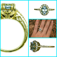 18 Karat Gold Oval Aquamarine Diamond Halo Ring Aquamarine 8 mm X 6 mm 32 Round Diamonds 0.46 CTW 3.8 Grams Size 7