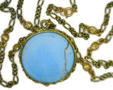 Turquoise Medallion Set in 7 Karat Yellow Gold 43 mm Round Seascape Bezel features Sea Horses Sea Shells Star Fish Suspends on Figaro Style and Sea Shell Links Chain 14 Dwt 24 Inches Long