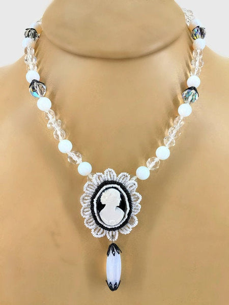 Black White Celluloid Cameo Single Strand Necklace with Vintage Opalescent, Aurora Borealis Glass Beads Midnight Blue Bead Caps Sterling Silver Toggle Clasp 38.9 Grams 22 Inches Long
