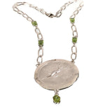 Aurora Mythological Pendant Single Strand Necklace Sterling Silver 1 1/2 Inches Wide 1 3/8 Inches Long 5 Peridot Gemstones 4 Emerald Cut 1 Oval 4.5 tcw 28 Grams 15.5 Inches Long