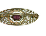Edwardian 10 Karat Gold and Amethyst Filigree Pin Green Rose Yellow Gold Flowers Garland Oval Gemstone 6-Prong Set 8 mm Long by 6 mm Wide 2.8 Grams 0.59 Inches Wide 1 1/3 Inches Long