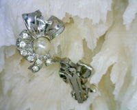 Vintage Faux Pearl Clip On Earrings Rhinestones Rhodium Plated White Metal Ribbon Motif 3/4 Inches Wide 1 Inch Long